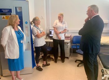 Health Minister Mike Nesbitt chatting with Julie Alexander (Assistant Director of Allied Health Professionals Workforce) & AHP staff