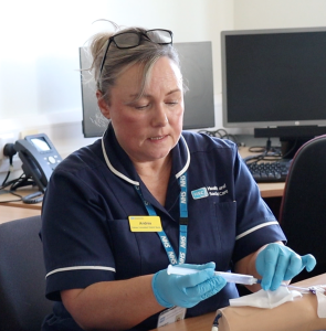 Andrea Training Community Nursing Staff On The Care And Maintenance Of PICC (peripherally Inserted Central Catheter) Lines