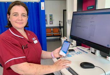 Cardiac Nurse Specialist Andrea Corbett Enters Patient Data From The Heart Failure@Home Service Onto Their System
