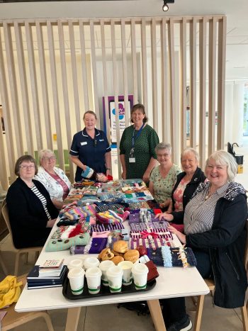 Jennifer Nicholson (Lead Nurse, Unscheduled Care) with Claire Sellar (Presbyterian Chaplain and Designated Chaplain to Inpatients Living with Dementia) with ladies from the Presbyterian Churches in Portglenone and Buckna
