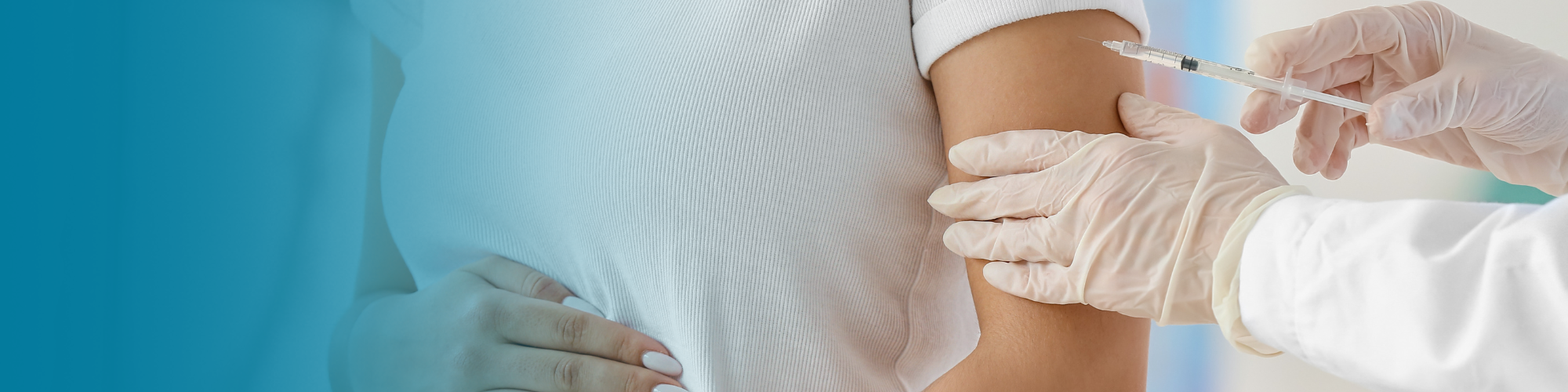 Picture of Pregnant person getting a vaccination
