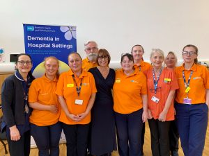 Assistant Director of Nursing at the Public Health Agency, Sandra Aitcheson celebrates with South Eastern Trust’s Dementia Companions