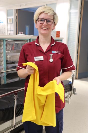 Cathy Shannon Demonstrating The Yellow Blanket Initiative
