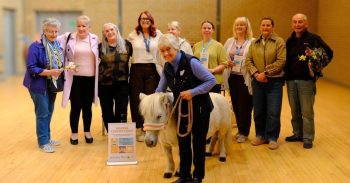 South Eastern Trust Senior Social Work Practitioner, Catherine McNiece together with members from the Making Connections Group and special visitor Mary the Shetland pony from Tiny Hooves Pony Tales