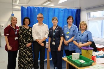 Dr David Robinson & Lyn Preece with the South Eastern Trust Vaccination Team