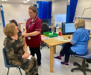 Maria McIlgorm Receiving Her Vaccination