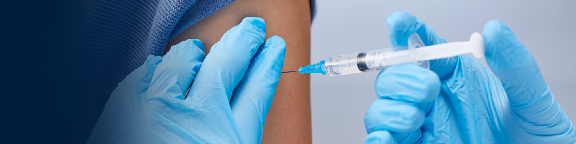 Picture of someone getting the flu vaccine in their arm